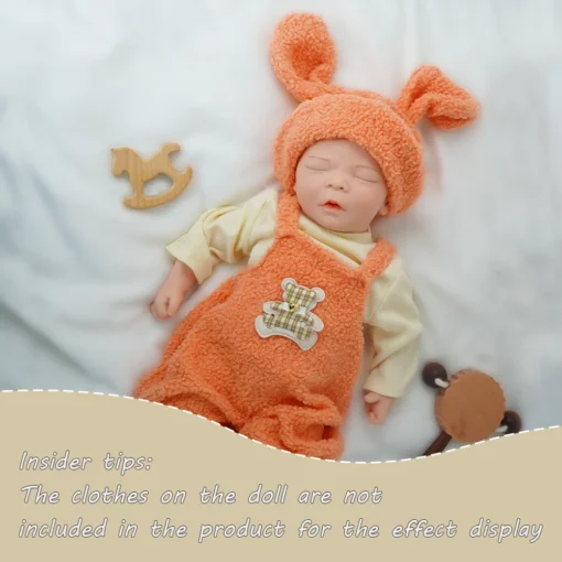 17.9-inch all silicone reborn baby girl -2.9 kg real weight. Has a natural deep sleep expression and a slightly open mouth.