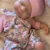 S5af9add5bf574d3e8fb30a86315e88dfP.webp Open Mouth 33cm Pascale Full Body Silicone Reborn Girl Doll With Painted Skin Washable Soft Touch Newborn Girl Silicone Doll