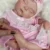 Sd740fcd294cf42fbaeeb764bfbffeb1fp-1.webp Saskia 18-Inch Adorable Peaches Silicone Reborn Doll - Handmade 3D Painted Lifelike Sleeping Newborn | Artist-Painted Baby