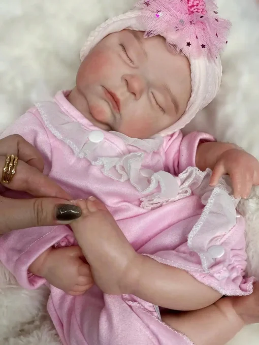 Sd740fcd294cf42fbaeeb764bfbffeb1fp-1.webp Saskia 18-Inch Adorable Peaches Silicone Reborn Doll - Handmade 3D Painted Lifelike Sleeping Newborn | Artist-Painted Baby
